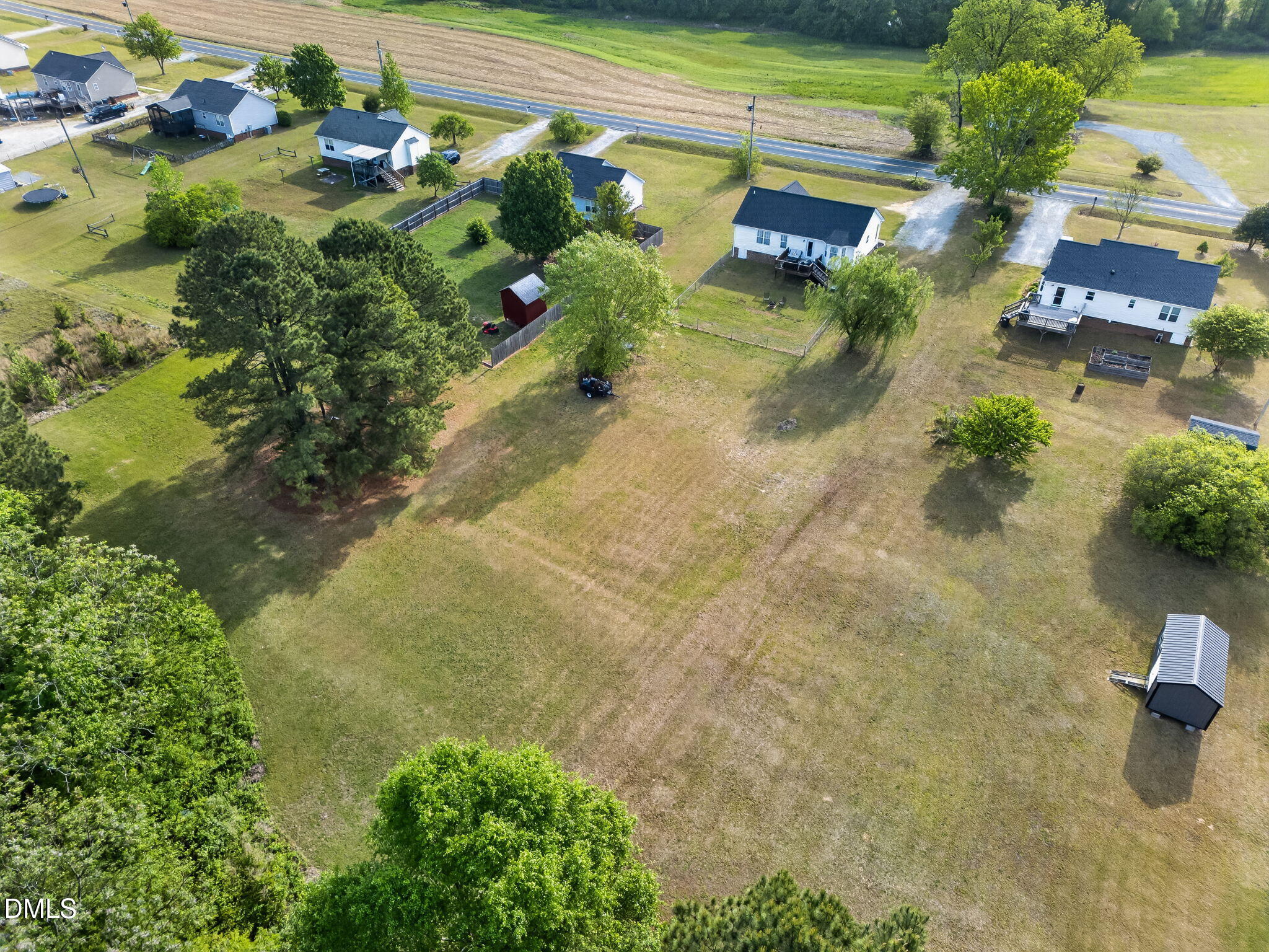 1101 Live Oak Road Coats, NC 27521 - Photo 2 of 29 an aerial view of a house with a yard