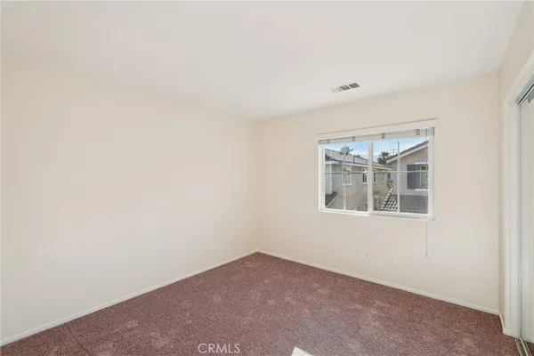 a bathroom with a shower and toilet