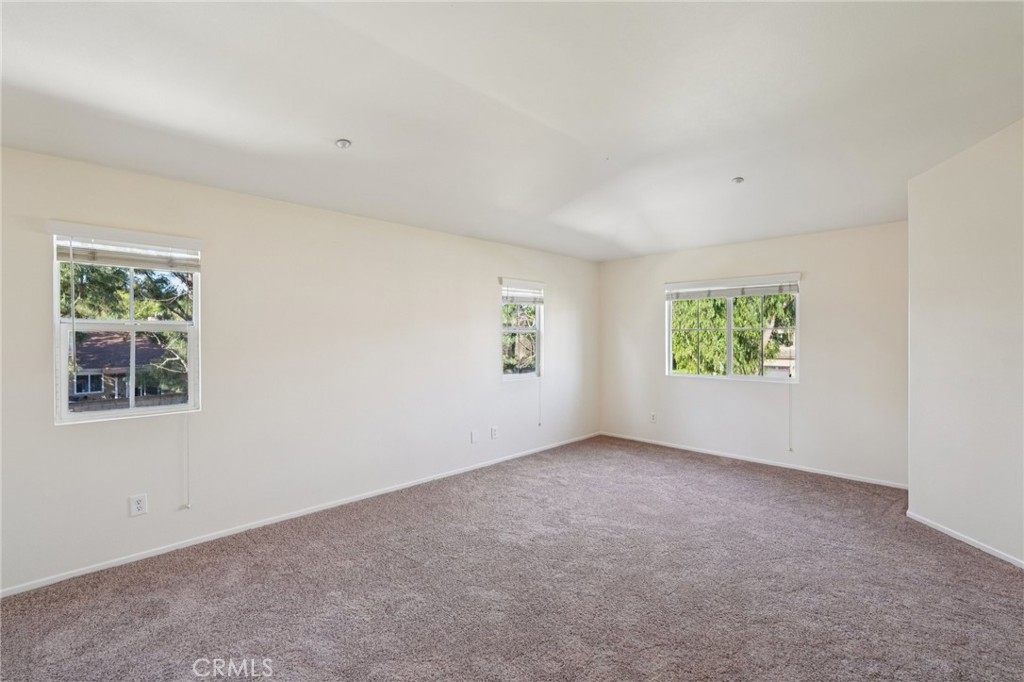 1793 Agrigento Avenue Riverside, CA 92507 - Photo 23 of 34 an empty room with windows