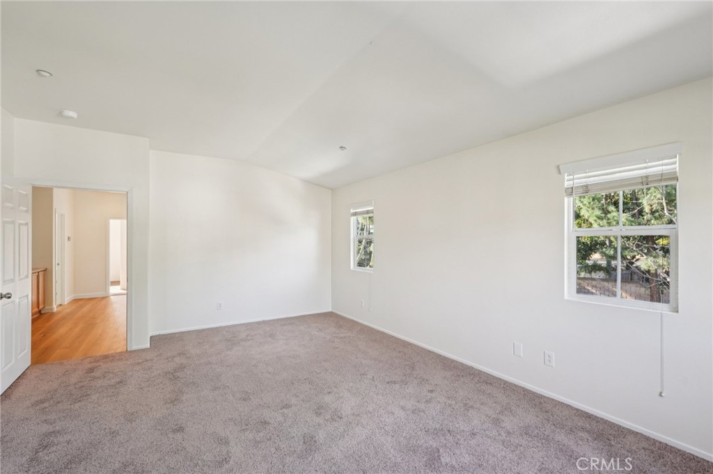 1793 Agrigento Avenue Riverside, CA 92507 - Photo 25 of 34 an empty room with a window