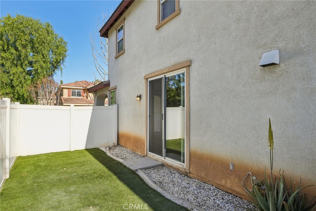 1793 Agrigento Avenue Riverside, CA 92507 - Photo 29 of 34 a backyard of a house with seating space