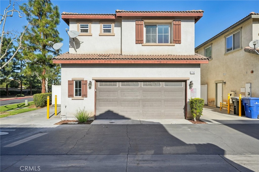 1793 Agrigento Avenue Riverside, CA 92507 - Photo 30 of 34 a front view of a house with garden