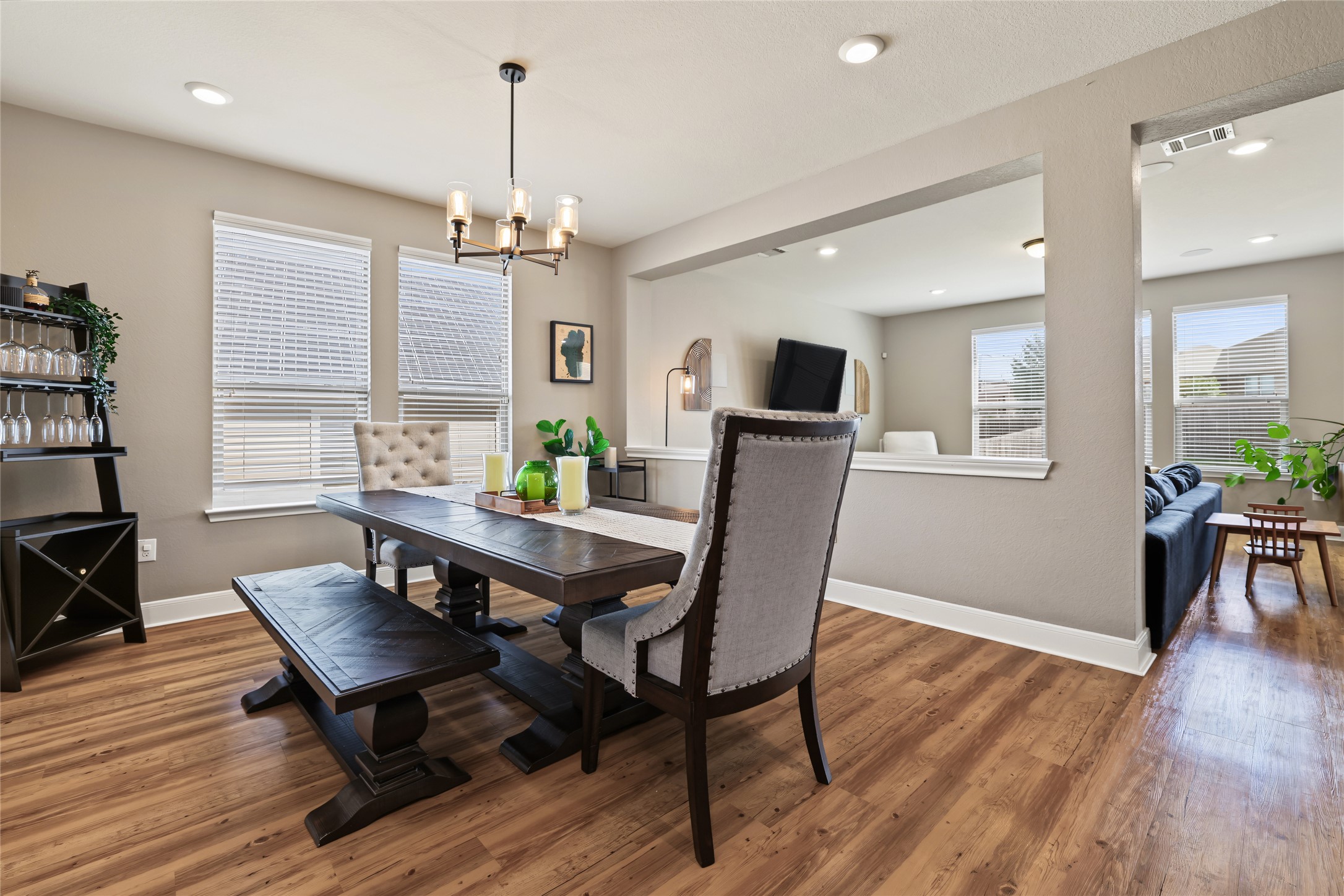 7501 Janes Ranch Road Austin, TX 78744 - Photo 7 of 19 Currently used as a formal dining room (which can easily seat 8,) this space features a half-wall so it's really versatile for a play area, reading area, etc.