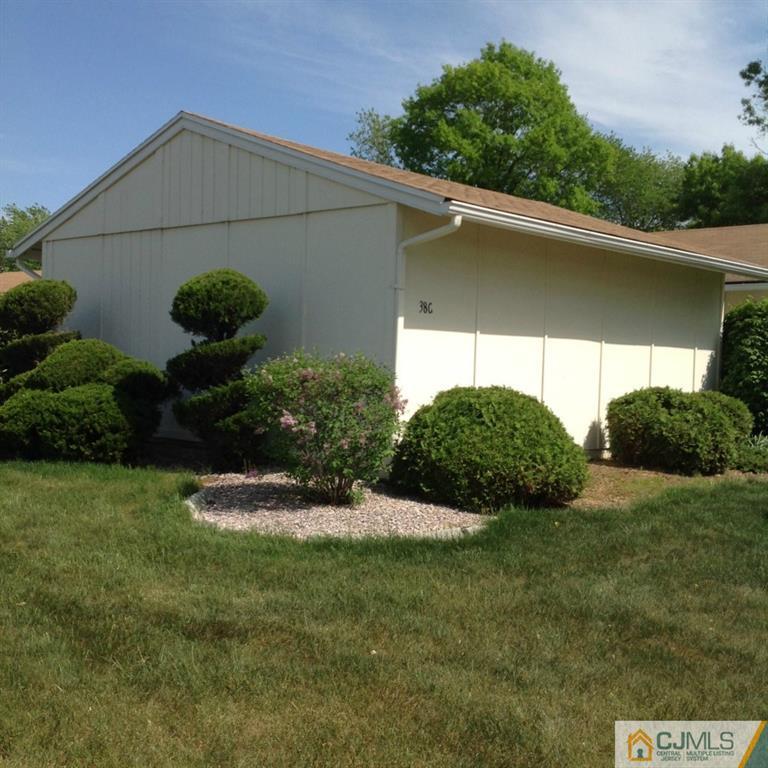 38 C Haddon Road Monroe Township, NJ 08831 - Photo 2 of 19 a backyard of a house with lots of green space