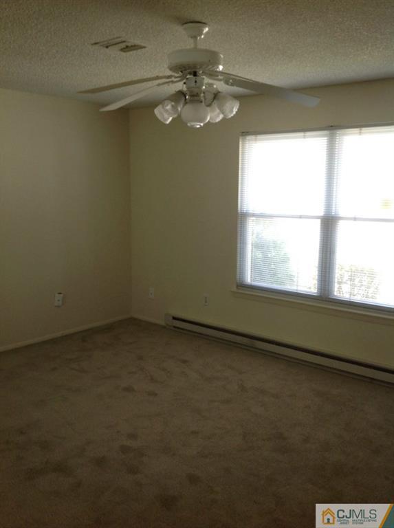 38 C Haddon Road Monroe Township, NJ 08831 - Photo 12 of 19 an empty room with a window