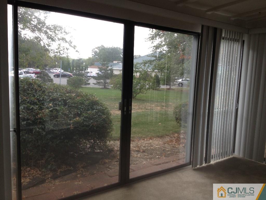 38 C Haddon Road Monroe Township, NJ 08831 - Photo 17 of 19 a view of a glass door and a window