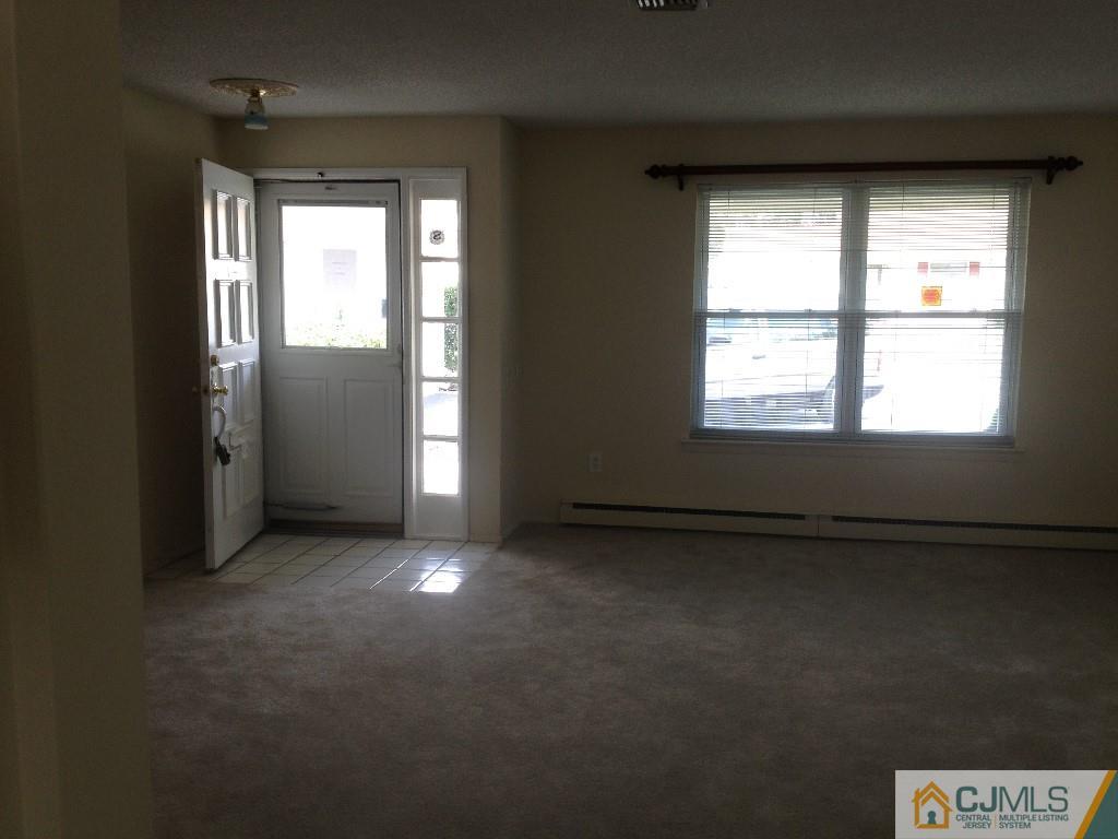 38 C Haddon Road Monroe Township, NJ 08831 - Photo 3 of 19 an empty room with windows