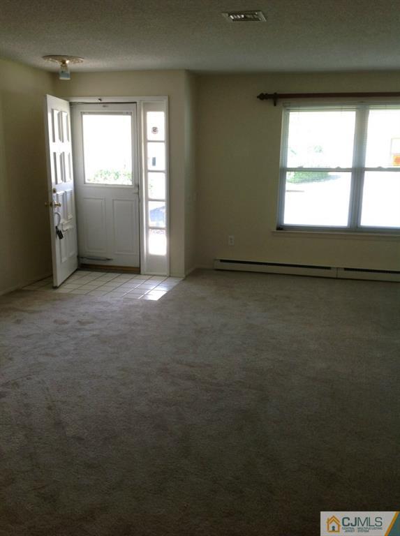 38 C Haddon Road Monroe Township, NJ 08831 - Photo 4 of 19 an empty room with a window