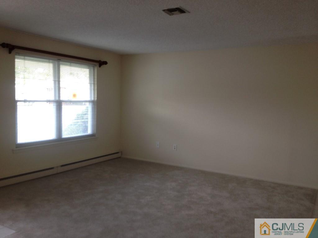 38 C Haddon Road Monroe Township, NJ 08831 - Photo 5 of 19 an empty room with a window