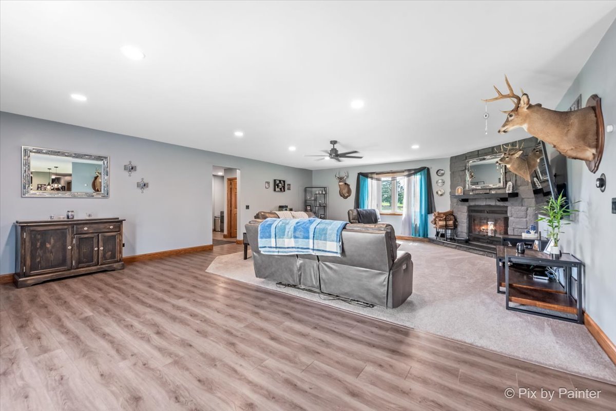 18570 Stevens Road Marengo, IL 60152 - Photo 13 of 45 a living room with furniture and a fireplace