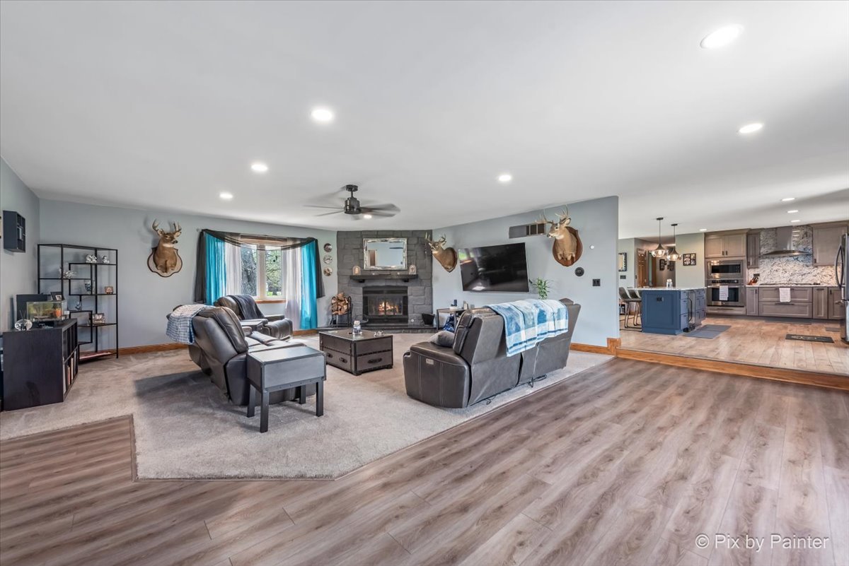 18570 Stevens Road Marengo, IL 60152 - Photo 14 of 45 a living room with furniture and a wooden floor