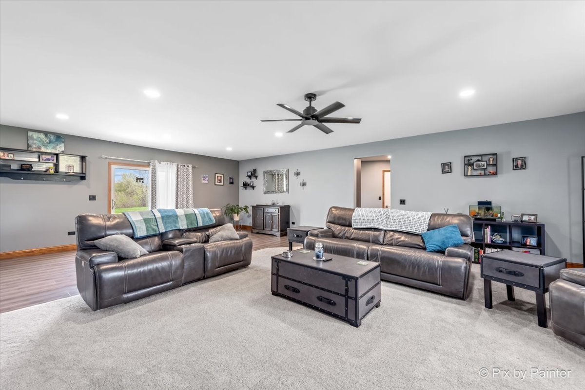 18570 Stevens Road Marengo, IL 60152 - Photo 16 of 45 a living room with furniture and a large window