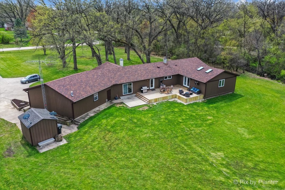 18570 Stevens Road Marengo, IL 60152 - Photo 3 of 45 an aerial view of a house with garden space and street view