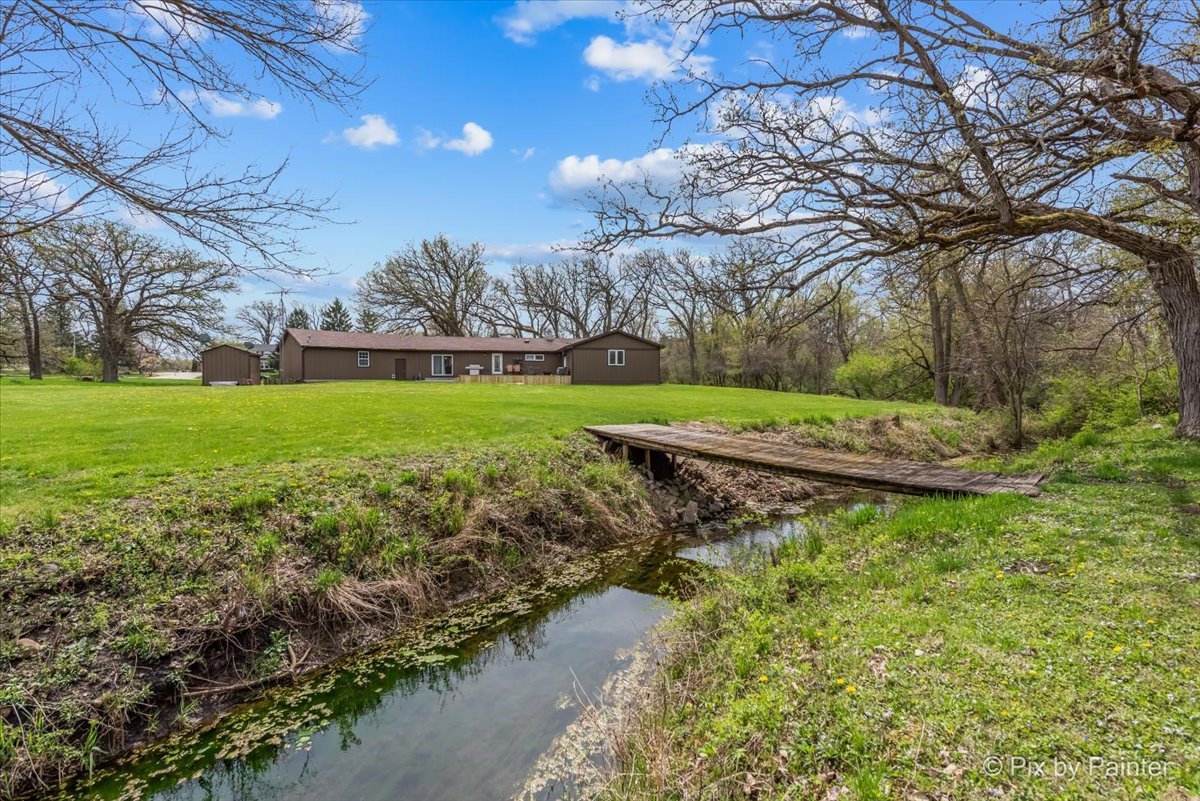 18570 Stevens Road Marengo, IL 60152 - Photo 32 of 45 a yard with lots of green space