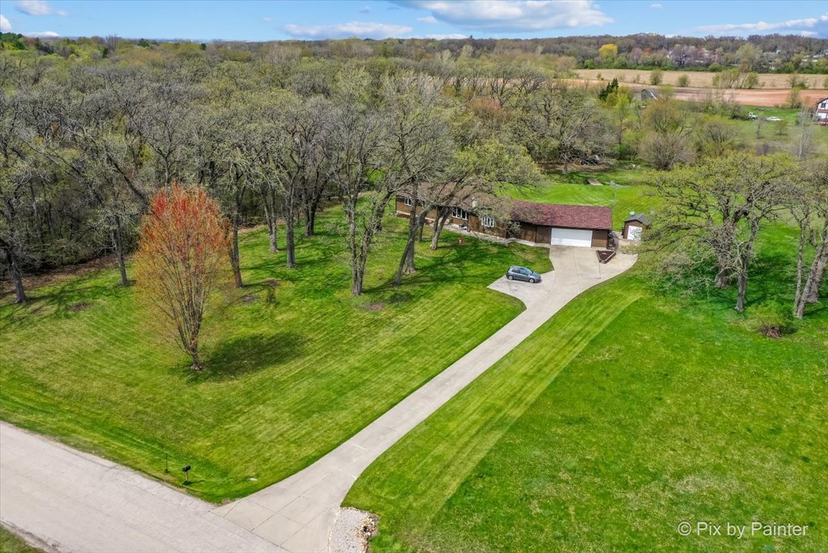 18570 Stevens Road Marengo, IL 60152 - Photo 38 of 45 a view of a garden with an outdoor space
