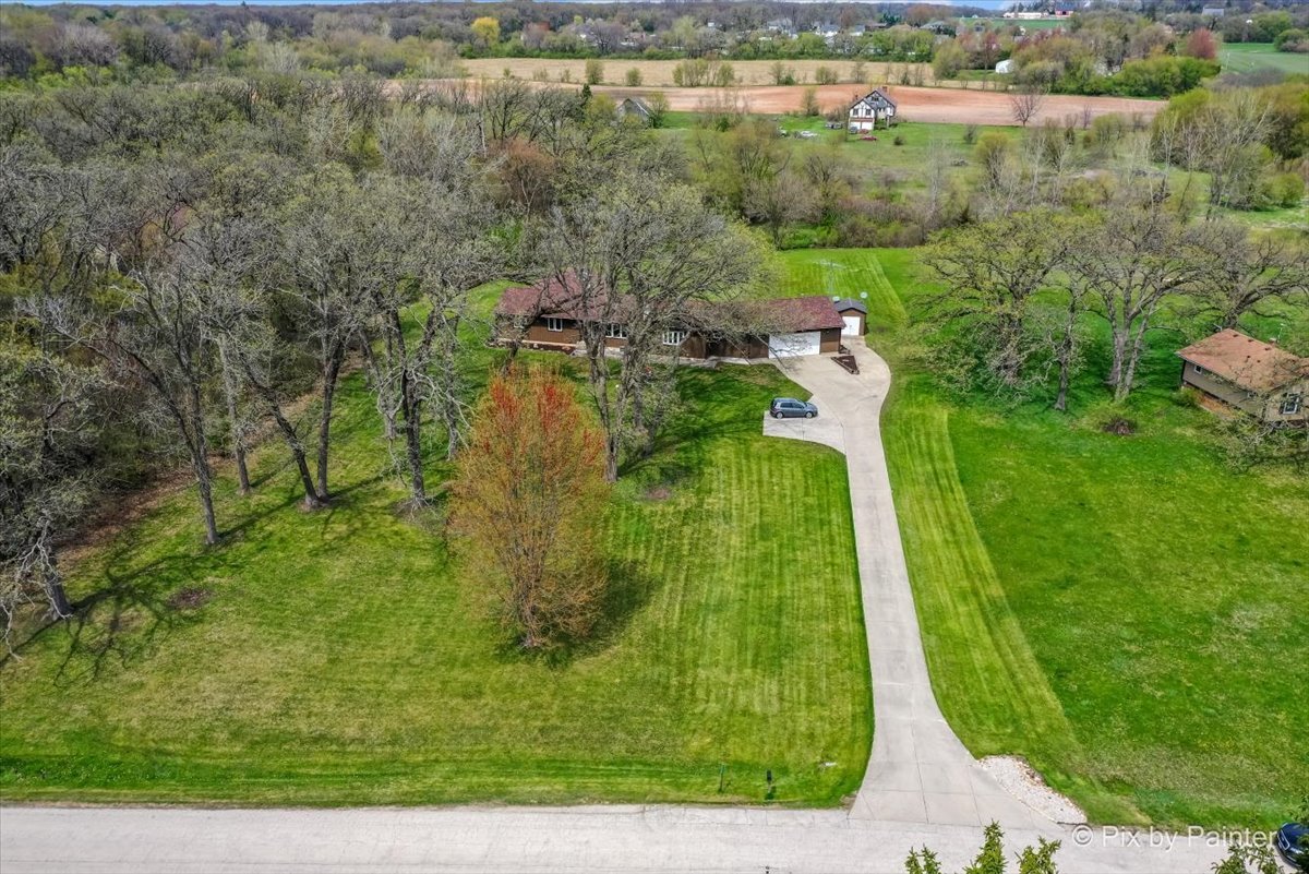 18570 Stevens Road Marengo, IL 60152 - Photo 39 of 45 an aerial view of residential houses with outdoor space