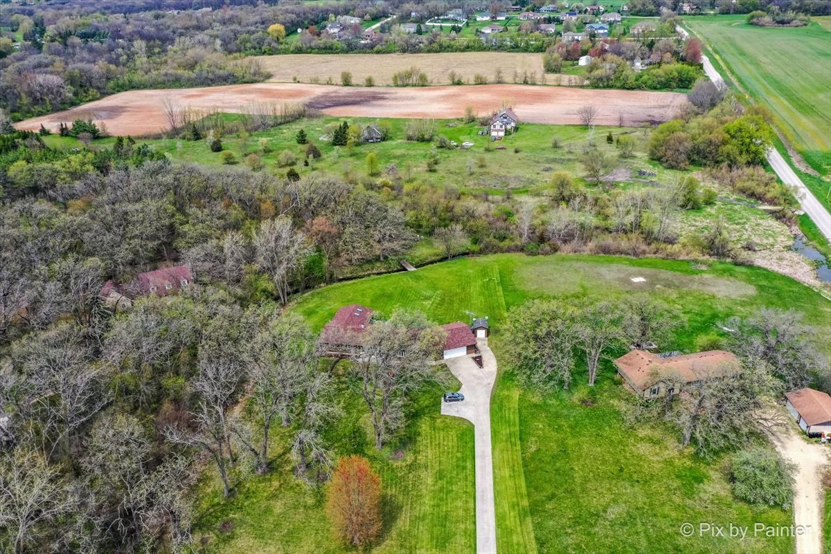 18570 Stevens Road Marengo, IL 60152 - Photo 5 of 45 an aerial view of a house with a yard