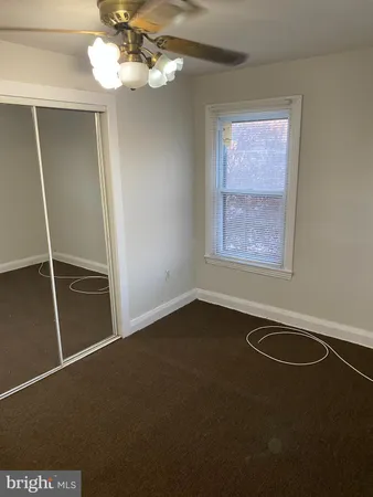 a view of a room that has a window in it