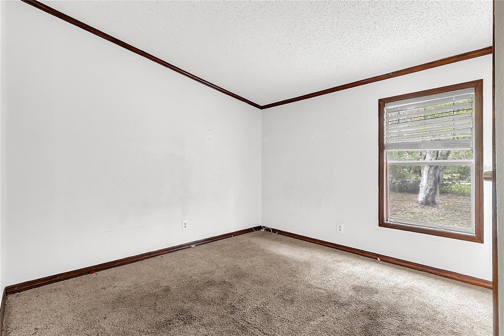 4685 D Street St. Cloud, FL 34772 - Photo 9 of 15 an empty room with windows