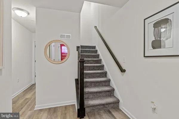 a view of a hallway with entryway
