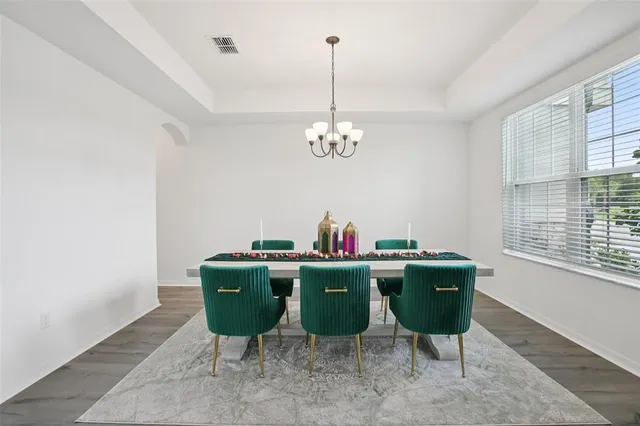 a room with a table and window