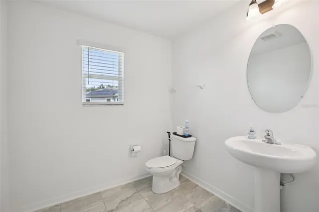 a bedroom with a bed and closet