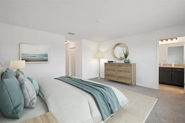 a view of an empty room with a kitchen