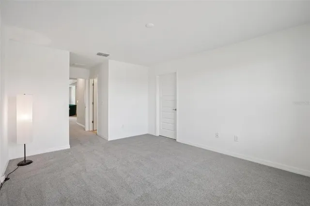 a view of a back yard from a balcony