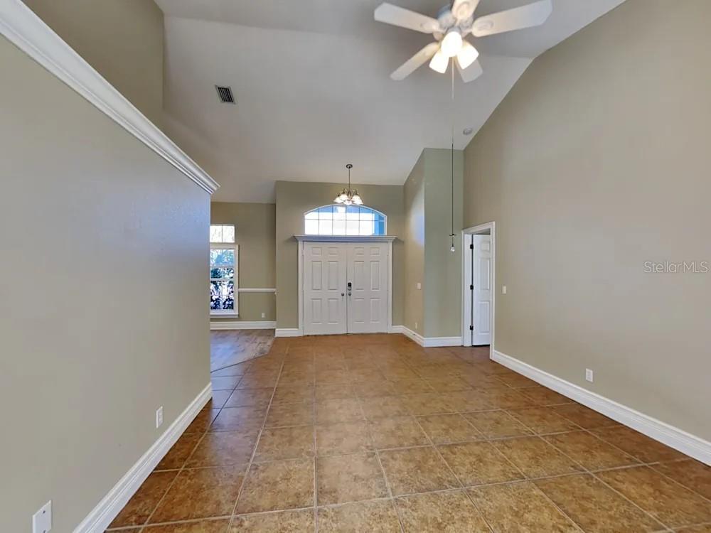22 Cabello Street Punta Gorda, FL 33983 - Photo 3 of 15 a view of an empty room with a window