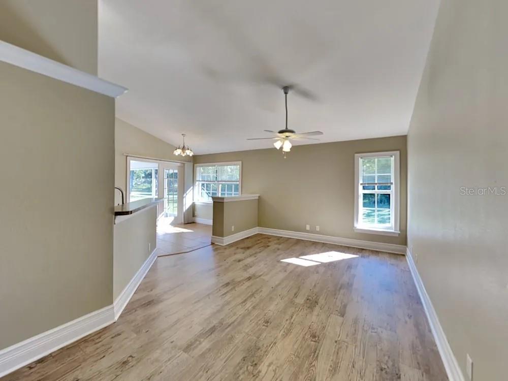 22 Cabello Street Punta Gorda, FL 33983 - Photo 4 of 15 a view of empty room with wooden floor