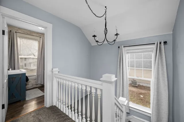 a view of entryway with wooden floor