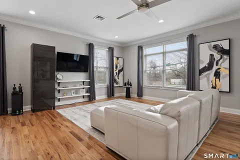 a bed room with a bed and a television
