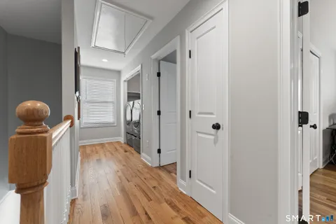 a hallway with wooden floor