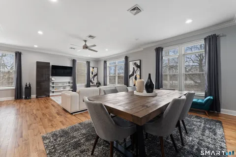 a view of a dining room with furniture
