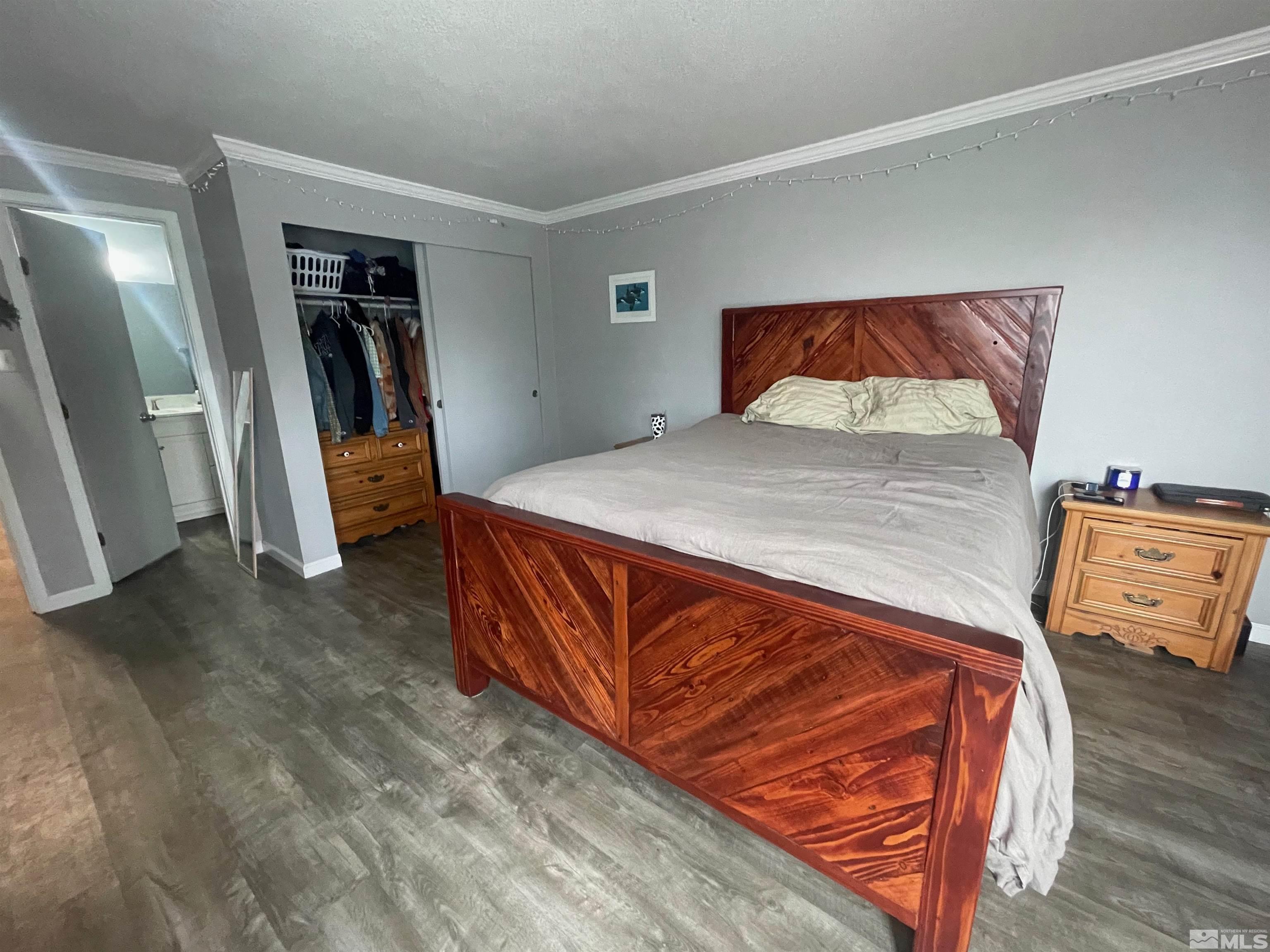 7550 Bluestone Drive Reno, NV 89511 - Photo 13 of 15 a bed room with a bed and a view of bedroom