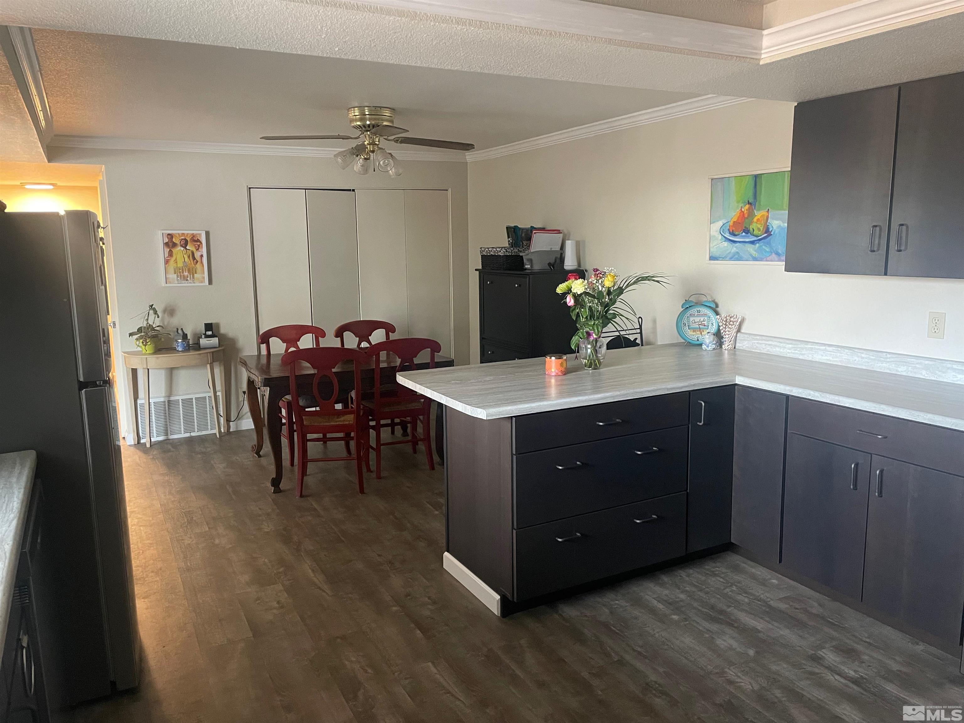 7550 Bluestone Drive Reno, NV 89511 - Photo 8 of 15 a kitchen with a table and chairs