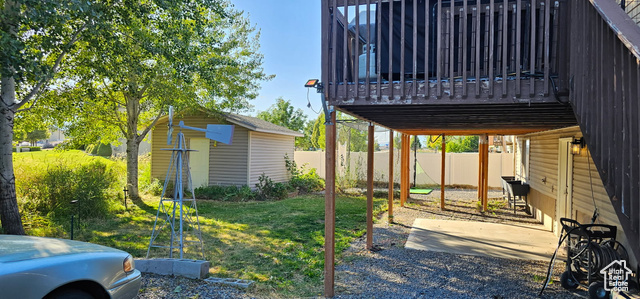 2269 Clear Creek Road Nibley, UT 84321 - Photo 17 of 27 View of patio / terrace with a wooden deck and an outdoor structure