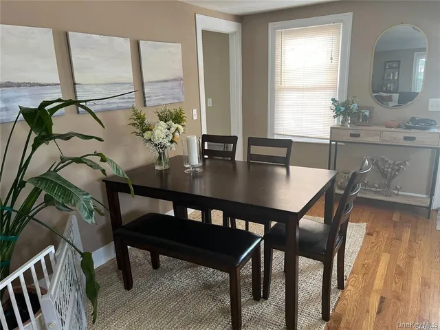 a bathroom with a sink vanity and mirror