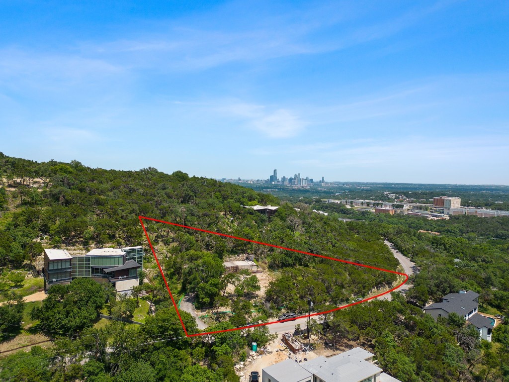 Redbud Trail hosts some of City of Westlake Hills' most coveted properties. Original house has been torn down, and lot is ready to build.