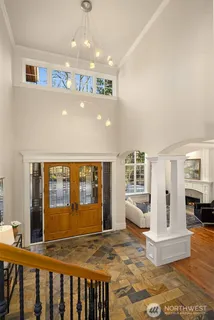 a view of kitchen with furniture and large window