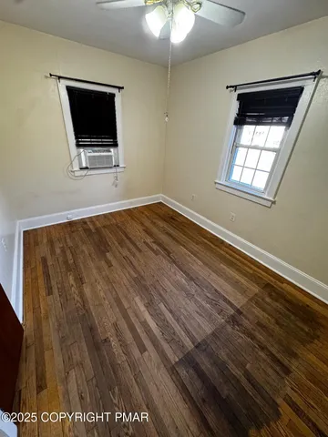 a view of a livingroom with a flat screen tv
