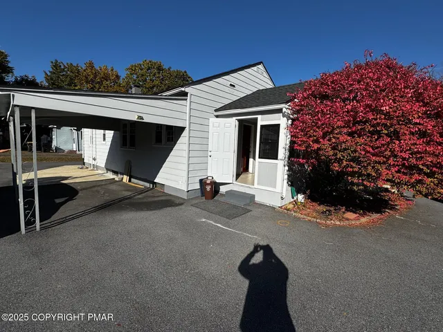 a view of a terrace with chairs