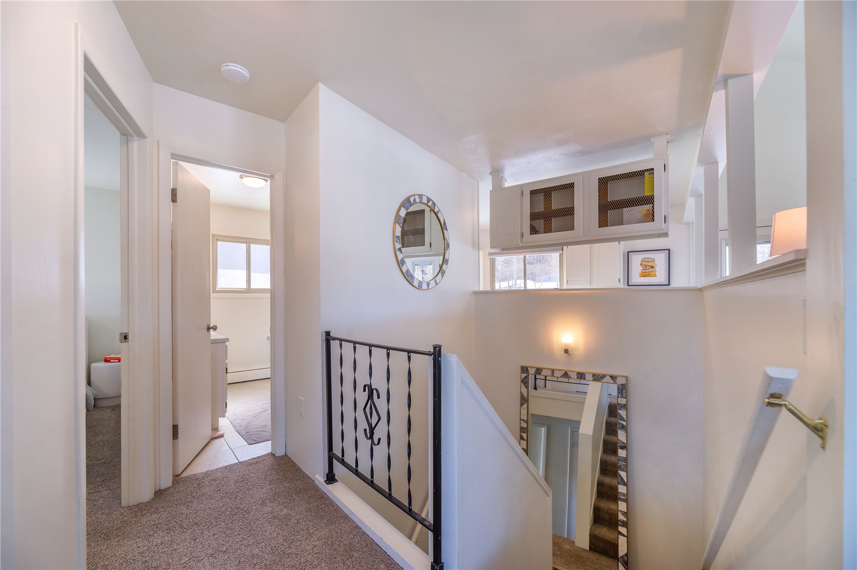 340 Buffalo Street Dillon, CO 80435 - Photo 22 of 40 a view of a hallway with windows and stairs