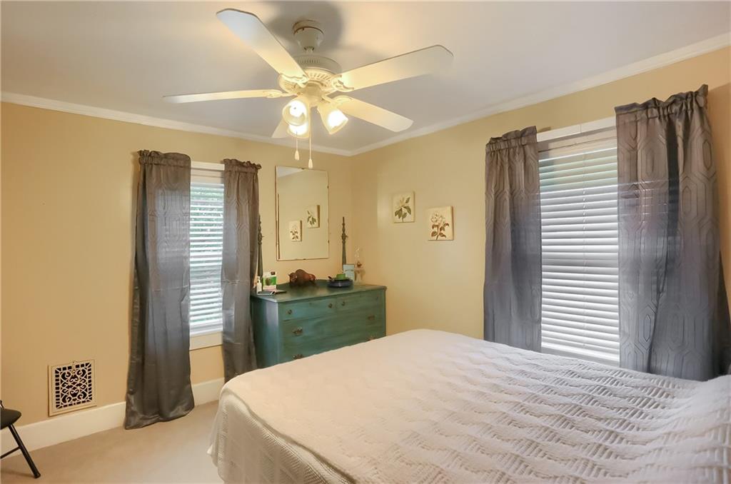 350 Oak Road Chicora, PA 16025 - Photo 14 of 25 a bedroom with a bed and a chandelier