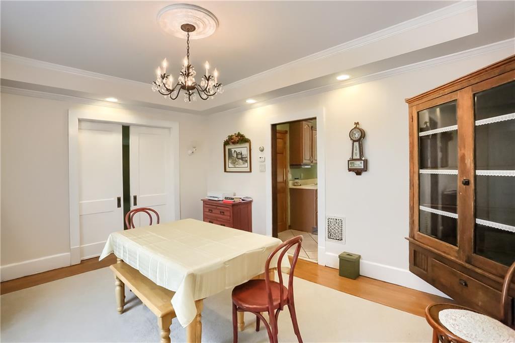 350 Oak Road Chicora, PA 16025 - Photo 8 of 25 a view of a dining room with furniture and chandelier