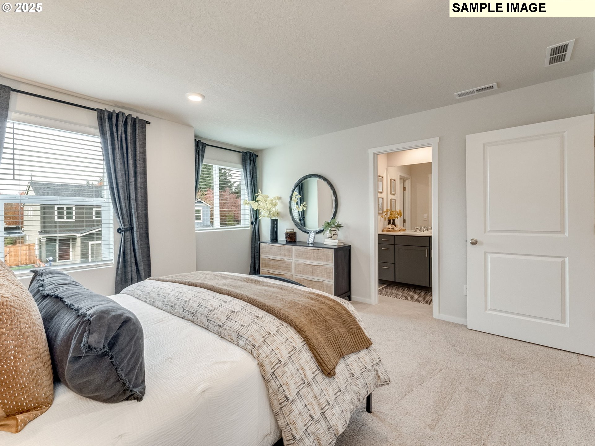 1103 Southeast 193rd Place Camas, WA 98607 - Photo 24 of 29 a bedroom with a bed and a dresser