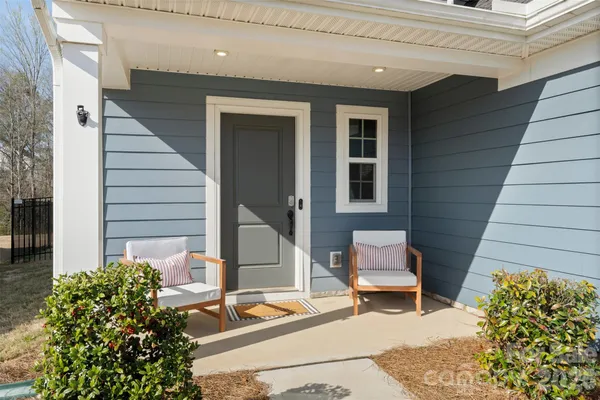 a building outdoor space with patio furniture