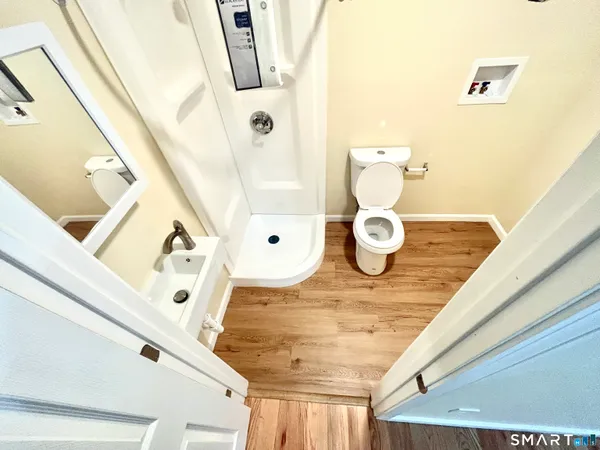 a bathroom with a sink and mirror