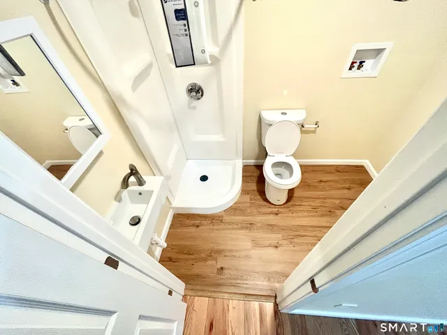 a bathroom with a sink and mirror