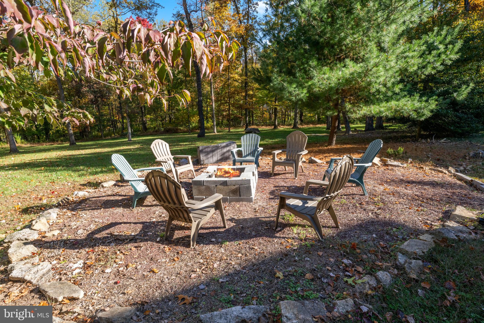 1623 Hilltop Road Spring City, PA 19475 - Photo 14 of 70 Cozy fire pit surrounded by nature's beauty.